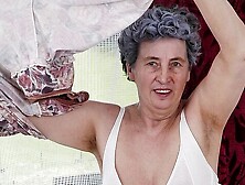 BBW mature lady with huge boobs Rosa fucks with a yellow toy