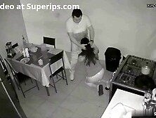 Hot Latina mom gives a blowjob in the kitchen