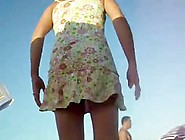 Women changing on the beach upskirt (fake)