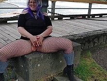 Blue haired Woman risky mastrubates in public business park