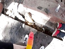 Naughty girl gives a pegging treatment to her nerdy boyfriend in an abandoned building