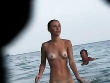 Naked and showing everything at the nude beach