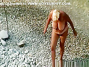 Mature nudist blonde woman