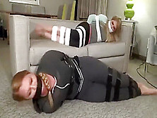 Two Cute Girls Struggle In Tape