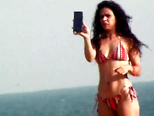 Hispanic Fitness Girl On The Beach Voyeur Clip