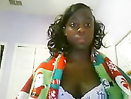 Ebony girl masturbates with a vibrator on her bed