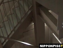 Two students tailed by a watcher for their pee captures