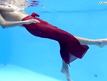 Girl In Red Dress Filmed Swimming Around Flashing Nice Pussy