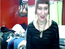 Provocative webcam girl touching her soft feet on the sofa