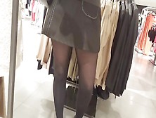 Shopper In Shiny Opaque Black Pantyhose And Upskirt