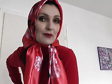 Lady Victoria Valente Showed Elegant Satin Headscarves With A Red Cashmere Turtleneck Sweater