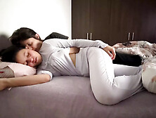 Lesbians Snuggle In Bed And Touch Their Asses