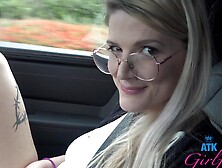 Amateur teen Riley Rose pees on the car and shows her tits