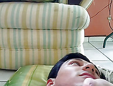 My face as her footstool ehile she plays videogames. 24