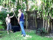 Two Horny Bald Guys Are Enjoying Outdoor Cock Sucking And Anal Intercourse In A Backyard