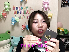 Adorable Japanese sex shop assistant showcases latest Japanese condoms during a wild fuck party