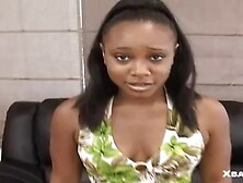 Ebony princess talks to the guy with the camera,  while wearing a long dress