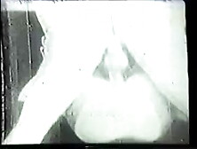 Vintage clip of southern belle with big tits sucking husband's big cock on sofa