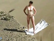 Brunette Milf Jerks And Sucks At The Beach