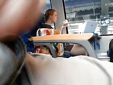 Guy plays with his dick in train