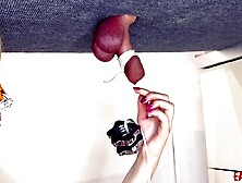 I play with a tiny penis on the milking board