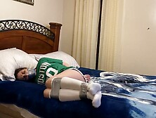Taped In Socks On Bed