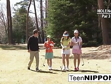 Cute Asian teen girls play a game of strip golf