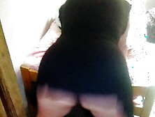 Shaking her ass to tease me