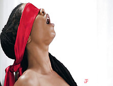 A blindfolded black lady cries out in orgasm to fuck her faster