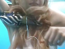 Beach cabin girl with enjoyable booty and boobs