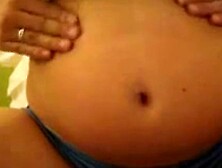 My friend Charlotte plays with her chubby belly