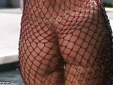 Sandy shows off her booty and masturbates