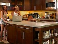Dillion Harper and Ajay Applegate (AJ Applegate) inside a kitchen in lesbian scenes