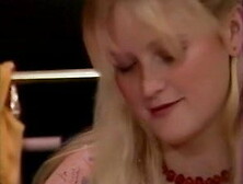 2 young lesbians and a mature woman