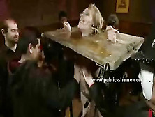 Blonde dress teared down while she is immobilized in cows device