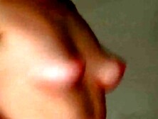 Naked photo-shoot with girl jiggling her tits