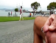 Stroking the pierced penis on the coast