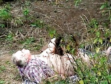 The doxy sees 2 old dudes screwing in the open countryside