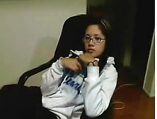 Amateur Asian teen with glasses fingers herself on cams (18+)