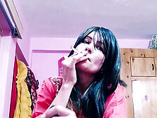 Sexy milf Bolly Karma gives a handjob and plays while enjoying a smoke