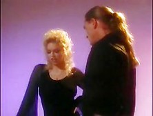 Jenna Jameson drops to her knees and sucks a hard schlong