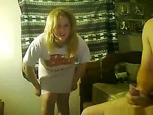 Chubby blonde teases naked,  while her bf jerks off in a condom.