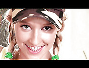 Adorable teenager in pigtails shakes her ass