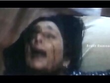 Kinky brunette girl screams loudly while she's laying on the bed