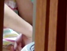 Stepsister sniffs fingers after stroking creamy pussy