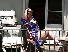 Curvy Girl Sunbathing On The Balcony