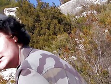 Having outdoor anal sex in army uniforms is a huge turn on for the brunette