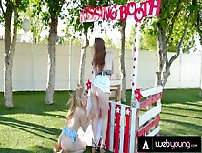 Lesbian Uses Kissing Booth To Fuck Girls