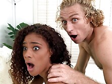 Slutty black model Scarlit Scandal nicely jumps on a big white dick