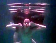 Hot Redhead Swims Naked And Kisses Guy While Diving Underwater.